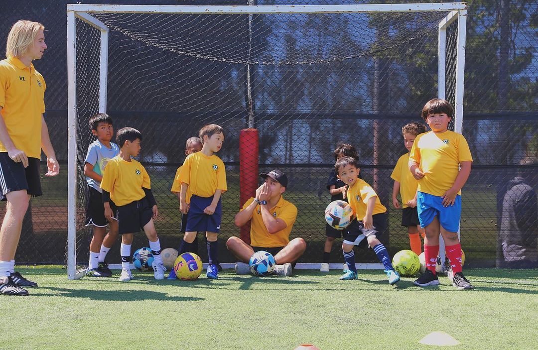 Children playing soccer